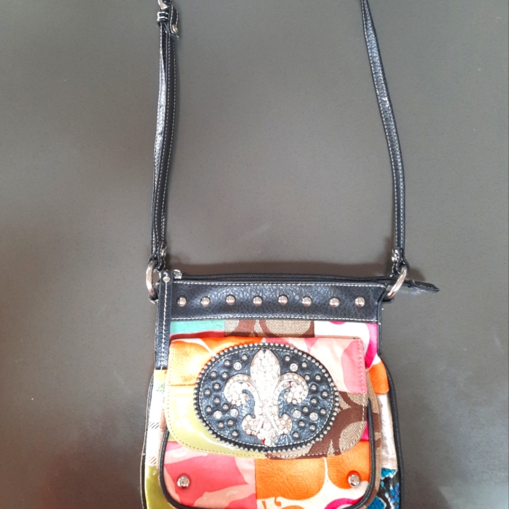Beautiful multi colored , jewel embellished shoulder purse.